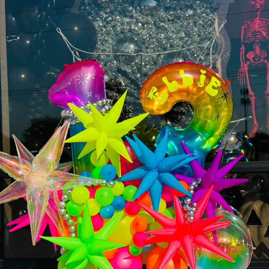 Rainbow 12 number stack with neon starbursts
