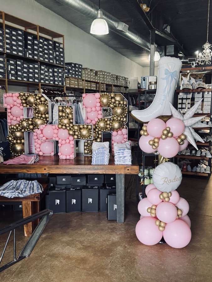Pink and gold PR balloon letters for Rodeo